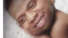 La foto muestra a un bebé con la cara de Jay Z digitalizada.