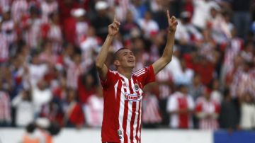 El 'Chatón' Henríquez celebra después de anotar un gol ante Puebla.