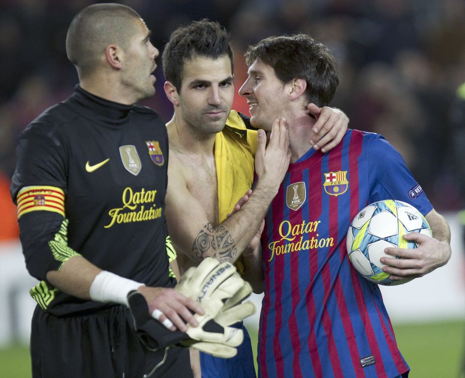 Víctor Valdés, Francesc Fábregas y Lio Messi al final del partido