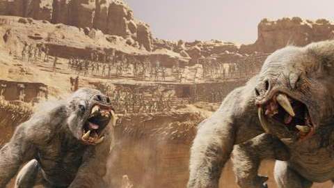 John Carter (Taylor Kitsch) huye de monstruos peligrosos en Marte en el filme 'John Carter', que se estrena hoy.