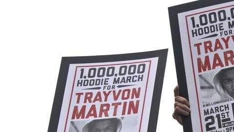 El movimiento "Ocupa Wall Street" convocó la manifestación en solidaridad con la familia del joven afroamericano asesinado.