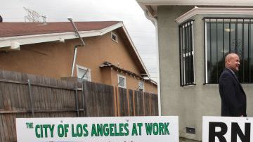 Una casa en particular, ubicada en la cuadra 200 de la calle W. 99th, fue el emblema de esta rehabilitación lograda con fondos federales.