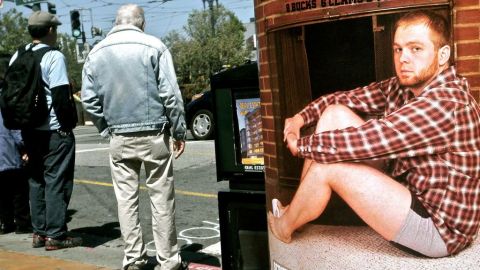 Póster y peatones en el famoso barrio homosexual de Castro en San Francisco.