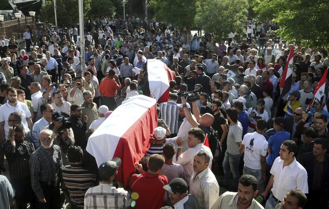 Funeral celebrado en Damasco el sábado debido a la violencia de los atentados que vive el país.