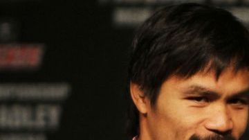 El filipino Manny Pacquiao y el estadounidense Timothy Bradley en conferencia de prensa.