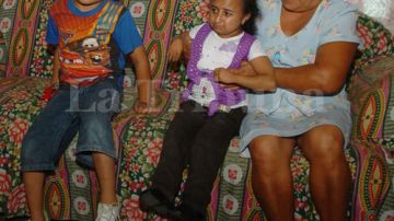 Cintia Pamela Morales con su madre y un sobrinito,
