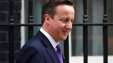 Cameron hoy a la salida del número 10 de Downing Street en Londres.