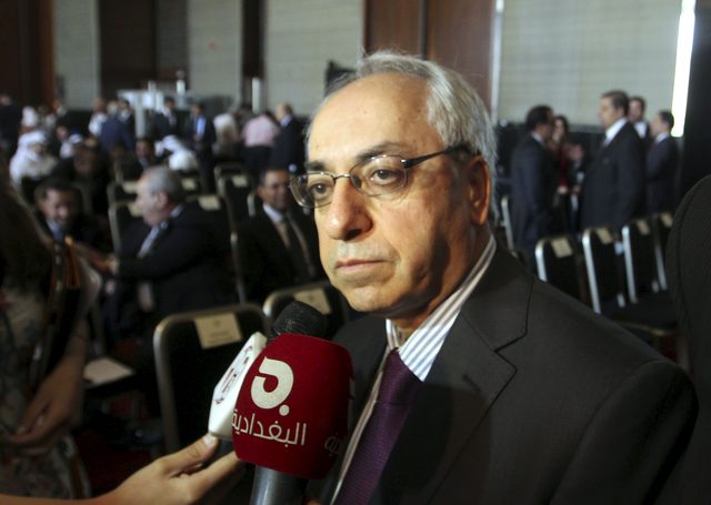 El líder del grupo opositor Consejo Nacional Sirio (CNS), Abdel Baset Sida, habla  previo a la sesión  de reunión  árabe, en El Cairo.