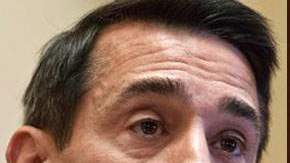 Darrell Issa y Eric Holder.