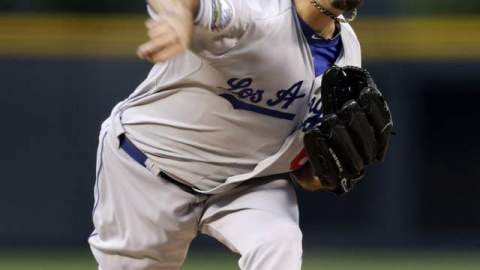 Josh Beckett ejecuta su primer envío en su noche fatal.