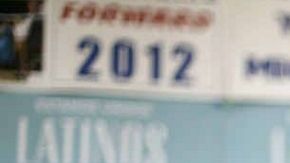 El Presidente Barack Obama llama a sus simpatizantes durante una visita a su oficina de campaña en Henderson, Nevada el 1o. de octubre de 2012.