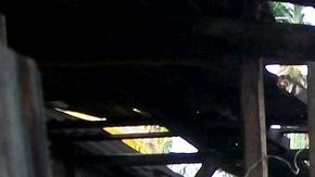 Aspecto de una vivienda afectada por Sandy en el poblado de Caimanera, en la provincia de Guantánamo (Cuba).