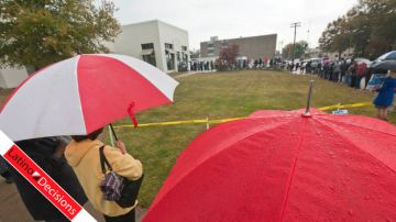 Voters line up in the rain this morning in Little Rock, Arkansas.