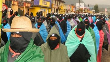 Integrantes del EZLN participan en una manifestación  en San Cristobal de las Casas, Chiapas, México.