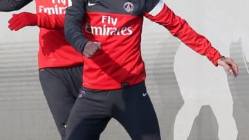 El mediocampista inglés David Beckham es visto durante su primera práctica de ayer con su nuevo equipo, el París Saint Germain.