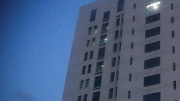 Fachada del edificio de 12 pisos dirigido por la 'Unidad 61398' del Ejército Popular de Liberación, sospechoso de ciberataques.