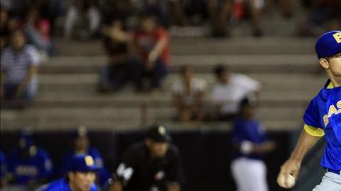 El lanzador André Rienzo de Brasil. La gran labor realizada por Brasil con su lanzadores y el bateo oportuno hizo que Japón tuviese que emplearse a fondo para no verse sorprendido en la jornada inaugural.