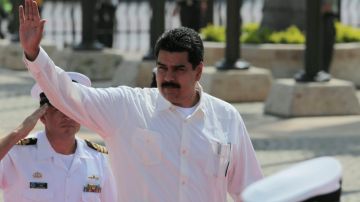 El Tribunal Supremo de Justicia venezolano explica su decisión sobre el hecho de que Nicolás Maduro pueda postularse a la presidencia siendo "mandatario encargado".