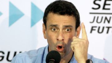 Henrique Capriles echa a andar la maquinaria de oposición en Venezuela, tras la muerte de Chávez..