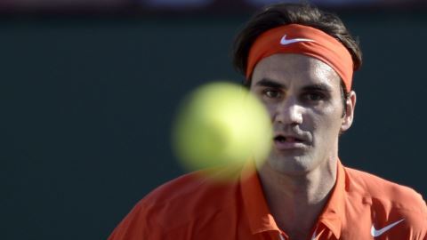 El suizo Roger Federer ante el croata Ivan Dodig.