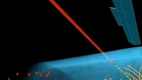 Gráfico que ilustra la colisión de partículas realizada en búsqueda del bosón de Higgs.