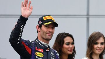La infelicidad de Mark Webber en el podio de Malasia.