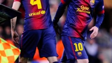 Lio Messi al momento de entrar  por Fábregas al minuto 62.