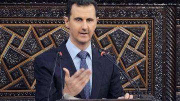 El presidente sirio, Bashar Assad, pronuncia un discurso en el Parlamento en Damasco, Siria. Israel lanzó un ataque aéreo en Siria, funcionarios estadounidenses dijeron que la noche del viernes.