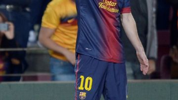 Lionel Messi celebra uno de sus dos goles frente al Betis ayer.