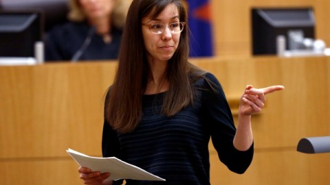 Jodi Arias points to her family as a reason for the jury to give her a life in prison sentence instead of the death penalty on Tuesday, May 21, 2013, during the penalty phase of her murder trial at Maricopa County Superior Court in Phoenix. Arias was convicted of first-degree murder in the stabbing and shooting to death of Travis Alexander, 30, in his suburban Phoenix. (AP Photo/The Arizona Republic, Rob Schumacher, Pool)