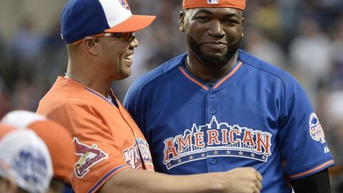 Carlos Beltrán (i) platica con David Ortiz durante la práctica del All Star.