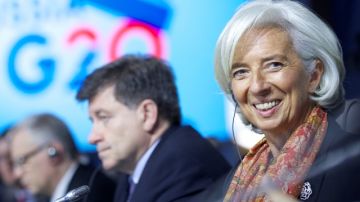 Christine Lagarde, the Managing Director of the International Monetary Fund, attends a meeting of the Group of 20 finance ministers in Moscow, Russia, Friday, July 19, 2013. Stashing profits offshore may soon get tougher for companies, thanks to an ambitious plan released Friday by the finance chiefs of leading world economies aimed at forcing multinationals to pay more taxes. (AP Photo/Alexander Zemlianichenko)