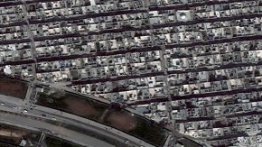 Foto satelital de Alepo, la ciudad más grande de Siria, en la que se pueden apreciar algunas áreas devastadas por la guerra.