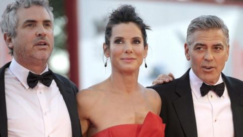 Alfonso Cuarón, George Clooney y Sandra Bullock presentan 'Gravity' en Venecia.