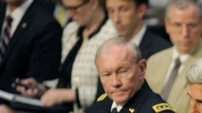 Los secretarios de Estado, John Kerry,   de Defensa, Chuck Hagel, y el jefe del Estado Mayor, Martin Dempsey, en el debate.