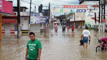 Inundaciones en Misantla en el estado de Veracruz, en México, donde se esperan  fuertes lluvias al paso de "Ingrid" en las próximas horas.