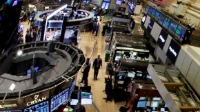 A board above the trading floor of the New York Stock Exchange shows the record closing number for the Standard & Poor's 500 stock index, Thursday, Oct. 17, 2013. The Dow Jones industrial index fell two points to close at 15,371, held back by declines in IBM, Goldman Sachs and UnitedHealth, which issued results that disappointed investors. (AP Photo/Richard Drew)