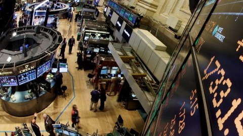 A board above the trading floor of the New York Stock Exchange shows the record closing number for the Standard & Poor's 500 stock index, Thursday, Oct. 17, 2013. The Dow Jones industrial index fell two points to close at 15,371, held back by declines in IBM, Goldman Sachs and UnitedHealth, which issued results that disappointed investors. (AP Photo/Richard Drew)