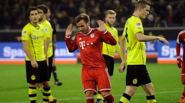 El ex jugador de Borussia Dortmund Mario Gotze parece decir "A mí ni me vean. Yo no fui".