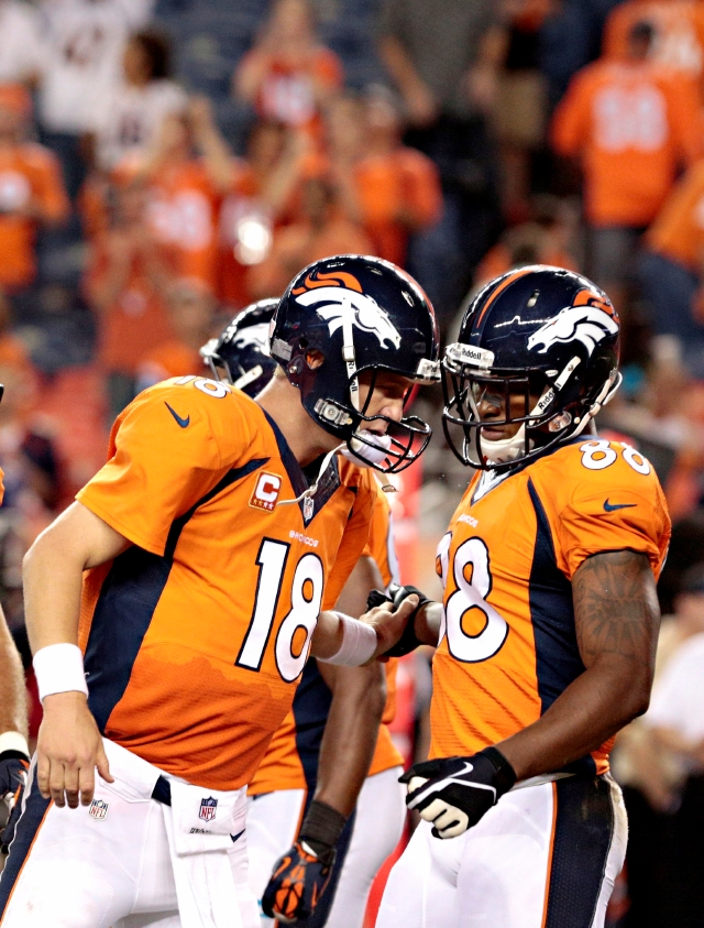 Manning (izq.) y Demarylius Thomas, dos pilares de los Broncos.