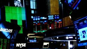 El Dow Jones subió 292 puntos después de la noticia de que la Reserva Federal iba a recortar sus estímulos económicos.