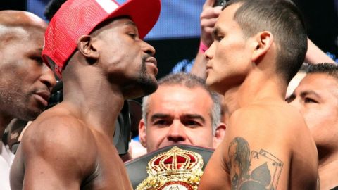 Miradas que matan... Floyd Mayweather Jr. y Marcos Maidana libraron dos grandes peleas en 2014.