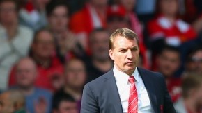 Brendan Rodgers  y  Steven Gerrard, entrenador y líder del Liverpool que esta noche juega con el Manchester City.