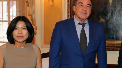 Oliver Stone junto al presidente Danilo Medina