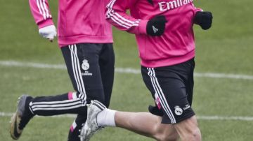 Gareth Bale (der.) estará hoy ante el Atlético.