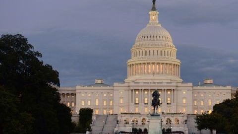 The US Capitol building is seen after sunset