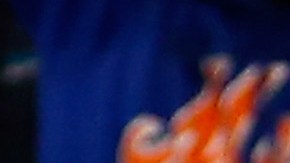 Jugadores de los Mets festejan una carrera de Lagares conseguida en el quinto inning.