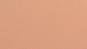 Dos inmigrantes de Siria son rescatados por otros en un bote cerga ce las costas de Grecia.