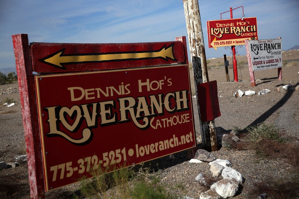 CRYSTAL, NV - OCTOBER 14: Signs for Dennis Hof's Love Ranch Las Vegas brothel are shown on October 14, 2015 in Crystal, Nevada. Former NBA player Lamar Odom was found unconscious during a visit at the brothel and has been hospitalized at Sunrise Hospital & Medical Center in Las Vegas. (Photo by Alex Wong/Getty Images)