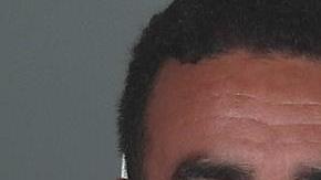 Raymond Guerra es acusado de intento de asesinato por supuestamente disparar a su esposa en la cara.